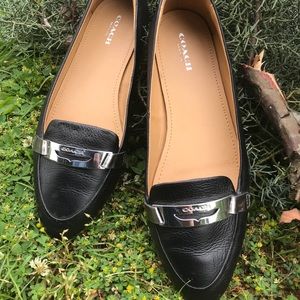 Flat black coach shoes